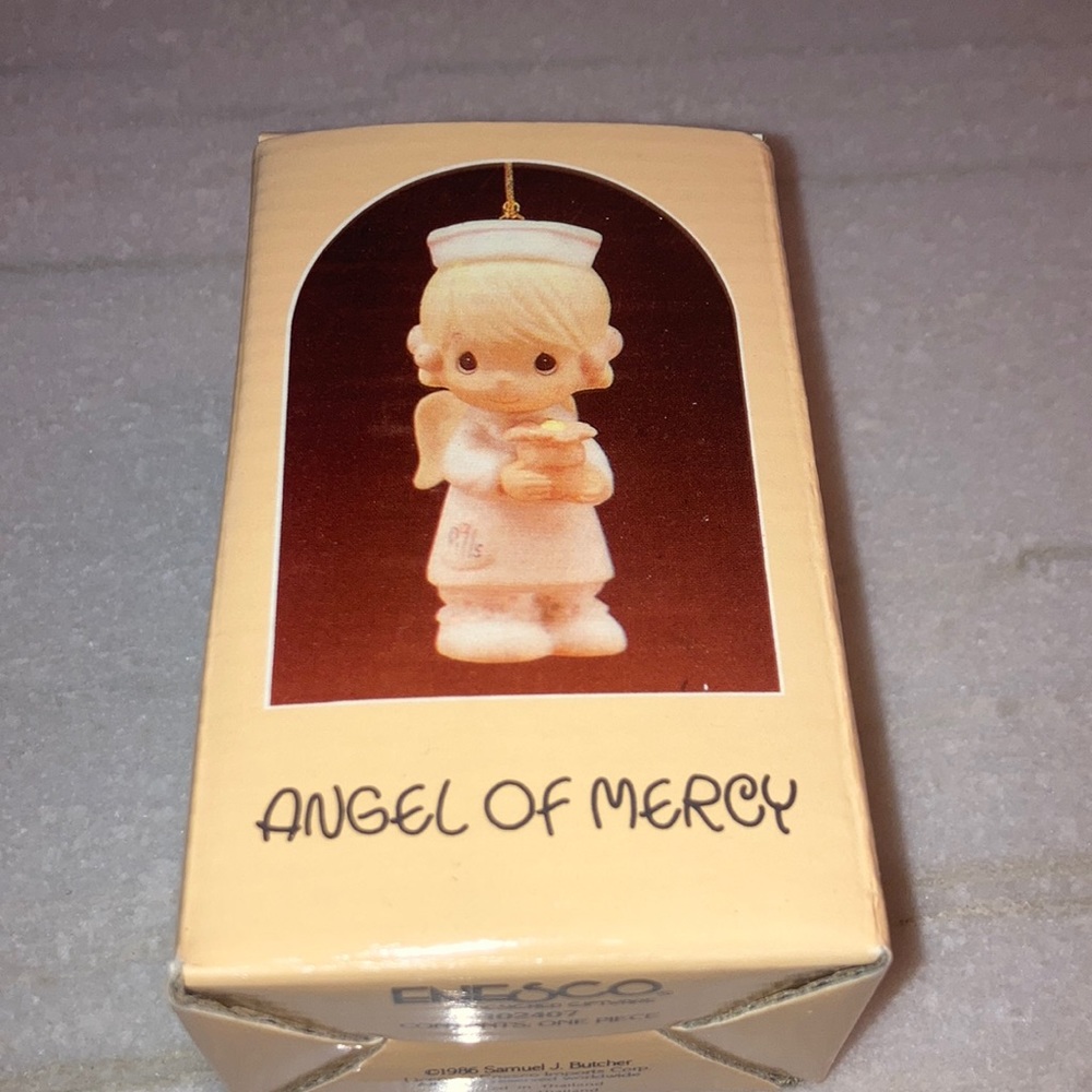 Precious moments ornament